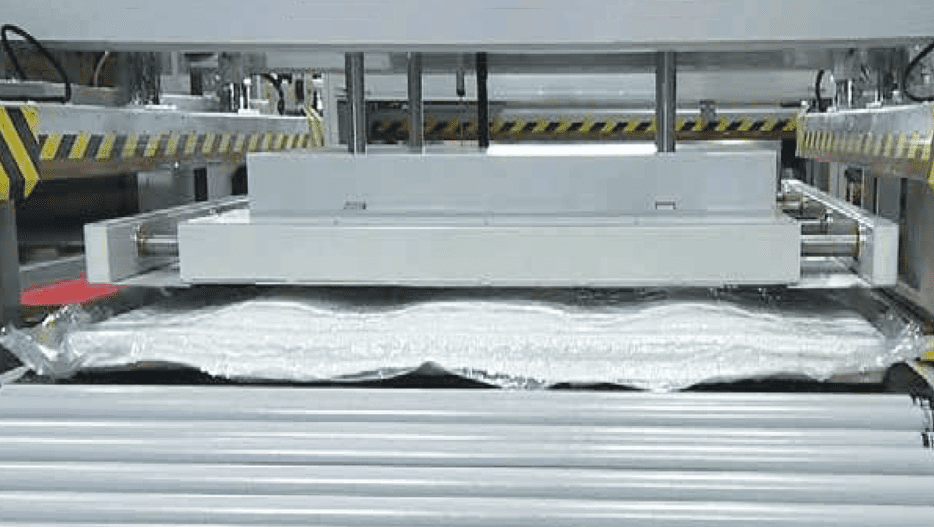 Auto pack fully-automatic mattress roll pak machine